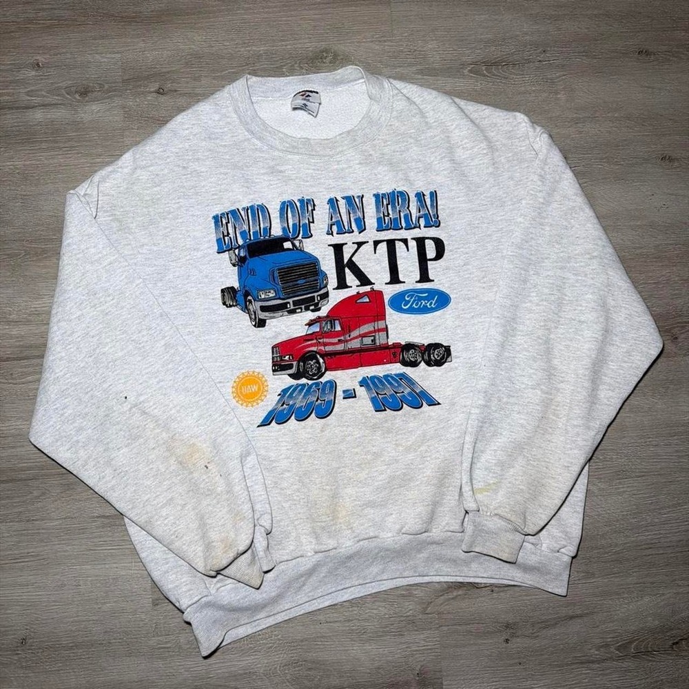 Gray Ford KTP crewneck sweatshirt with graphic of two semi-trucks
